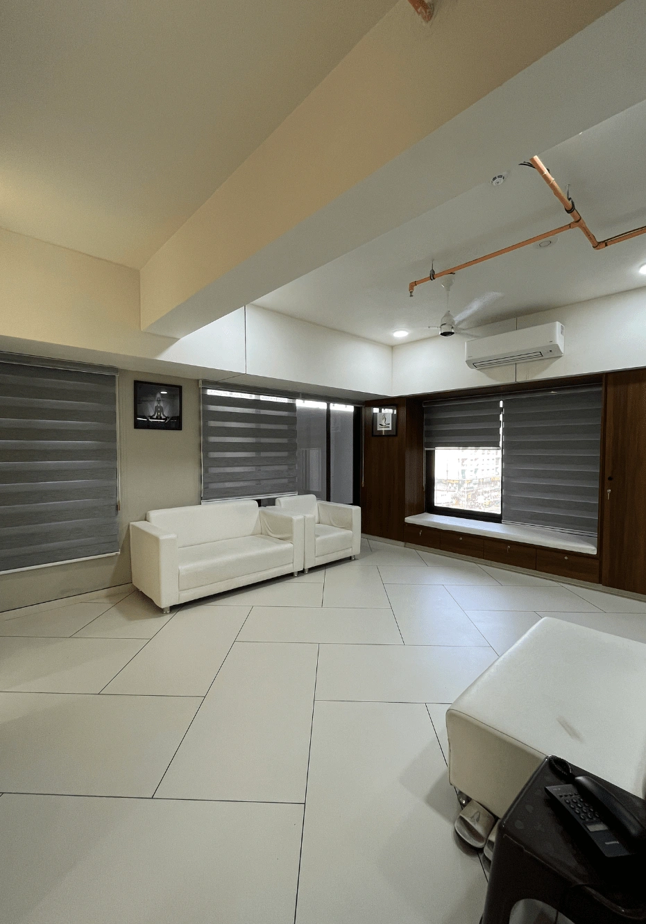 Daylit waiting area with window seating