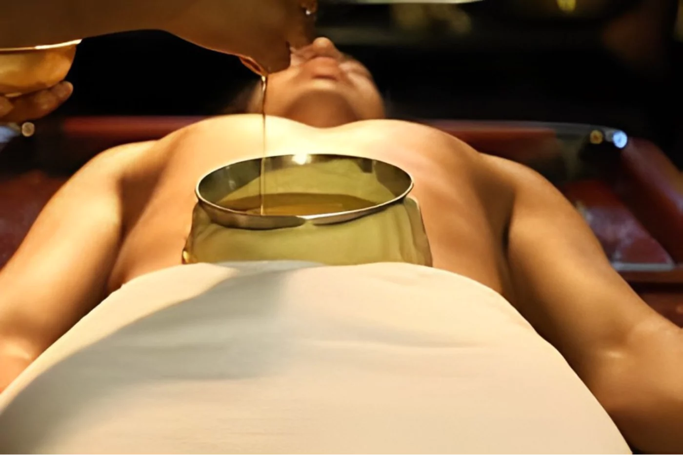 Restore digestive fire with warm oil over the navel